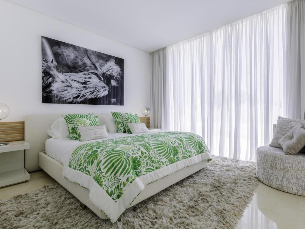 Postel nebo postele na pokoji v ubytování Fantástica Villa moderna en Rio Real