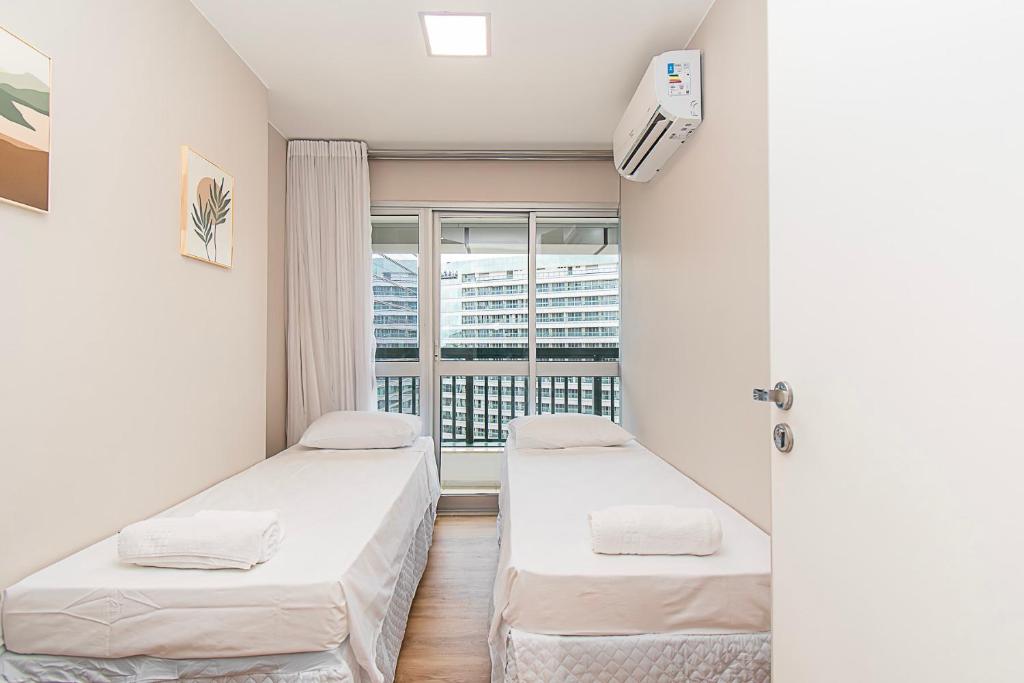 Postel nebo postele na pokoji v ubytování BSB STAY Flats Particulares - Fusion SHN