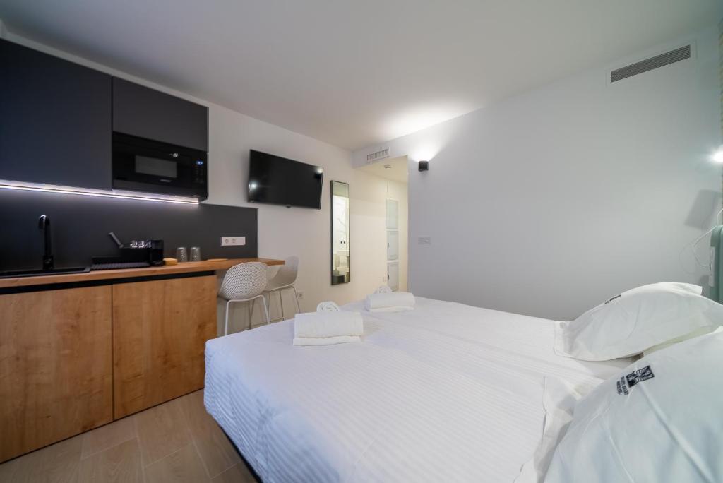 Postel nebo postele na pokoji v ubytování Alicante Smart Accommodation