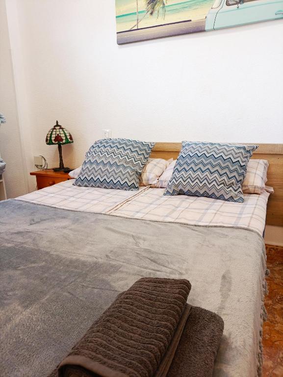 A bed or beds in a room at Apartamento MIRAMAR
