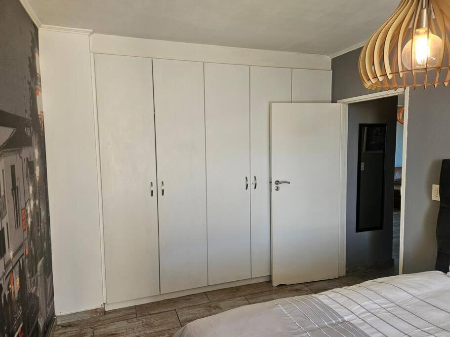 Ένα ή περισσότερα κρεβάτια σε δωμάτιο στο SS Luxury Apartments Island Club