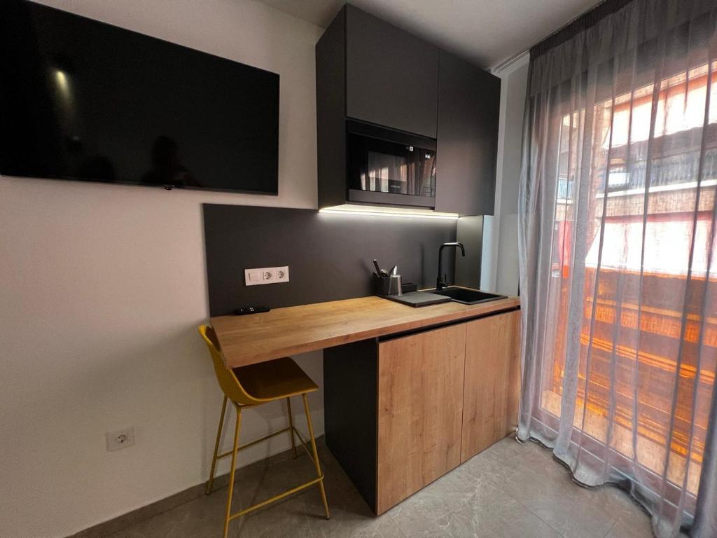 Kuchyň nebo kuchyňský kout v ubytování Alicante Smart Accommodation