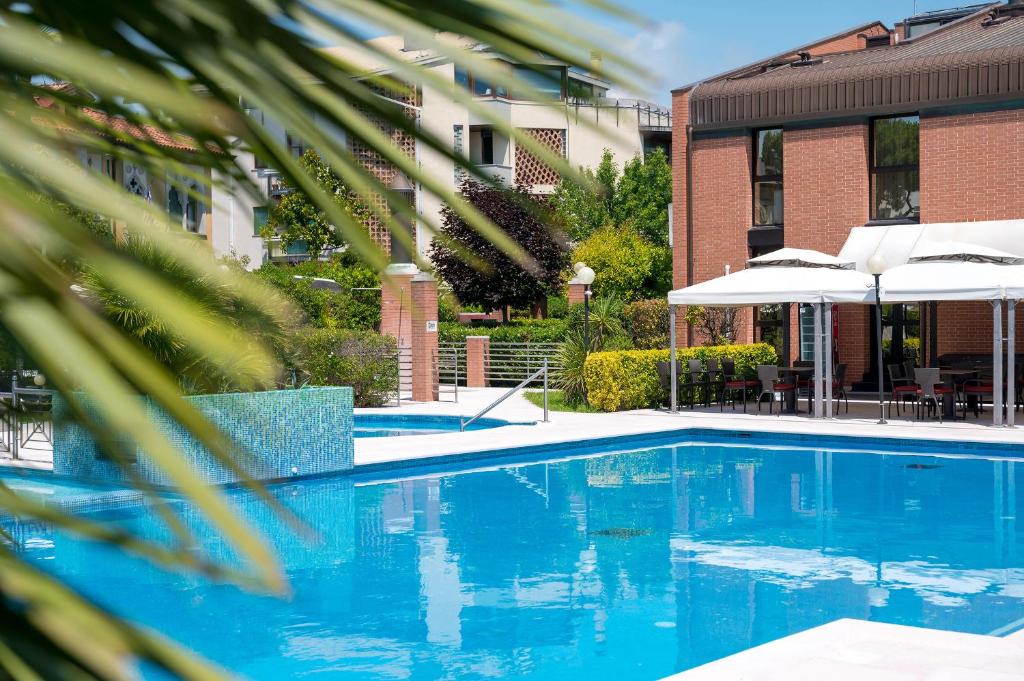 Bazén v ubytování DB Villas Le Ville del Lido Resort nebo v jeho okolí