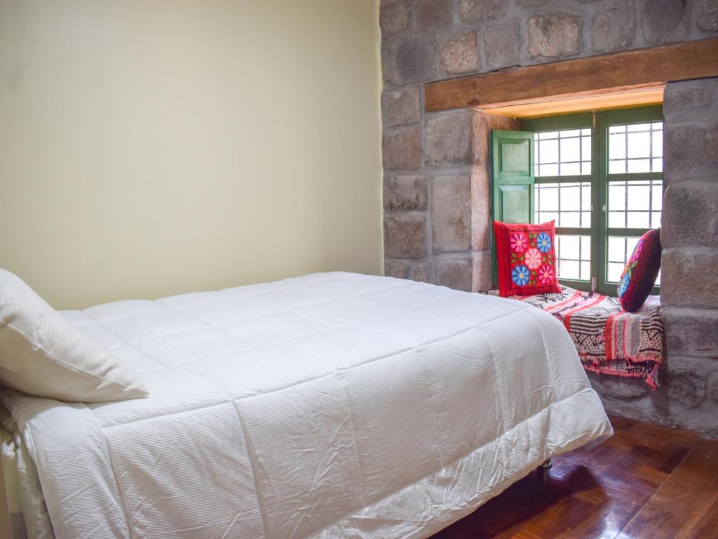 Postel nebo postele na pokoji v ubytování Acogedor Departamento en Barrio Resbalosa, a 5 Min de la Plaza de Cusco