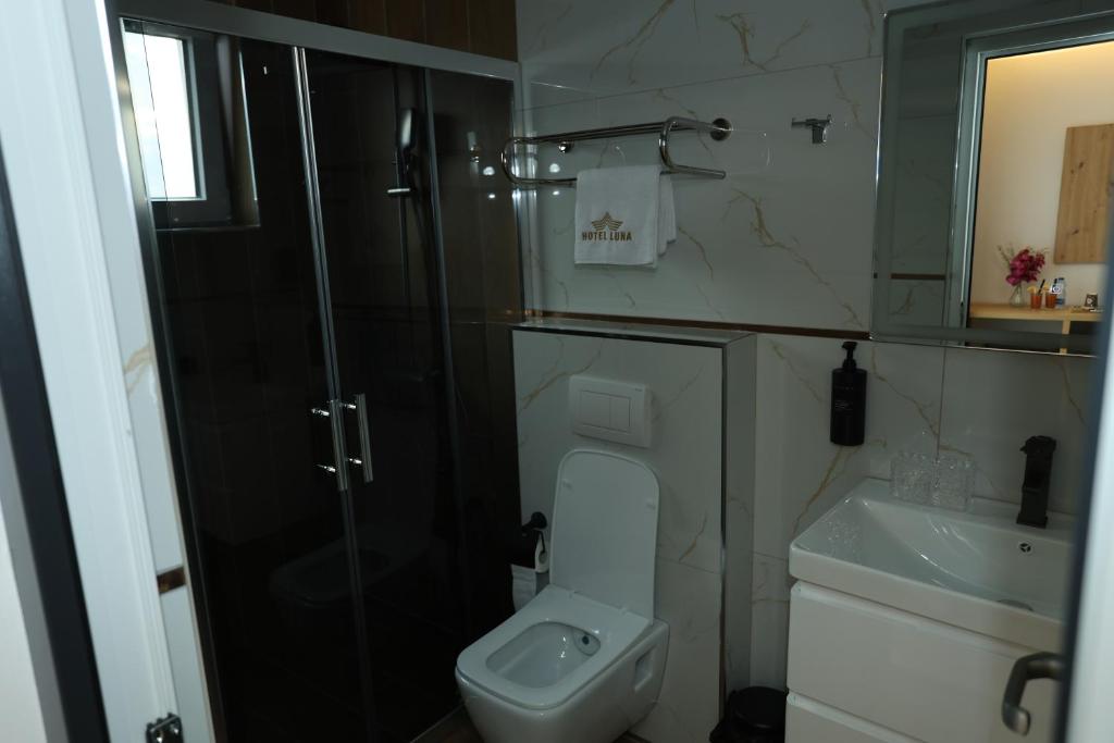 Koupelna v ubytování Hotel Luna