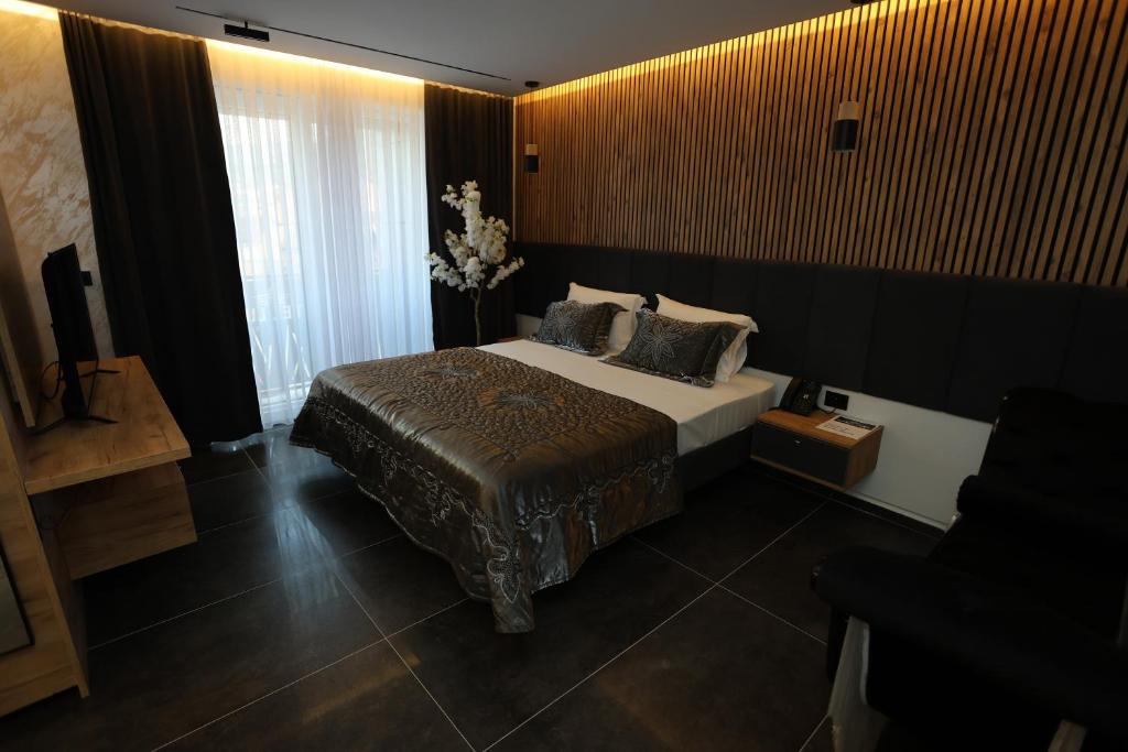 Postel nebo postele na pokoji v ubytování Hotel Luna