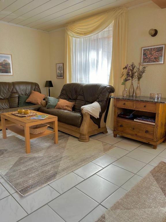 Posezení v ubytování Ferienhaus an der Uniklinik