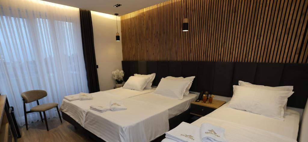 Postel nebo postele na pokoji v ubytování Hotel Luna