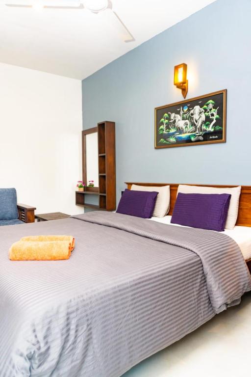 Postel nebo postele na pokoji v ubytování Surf Lavender