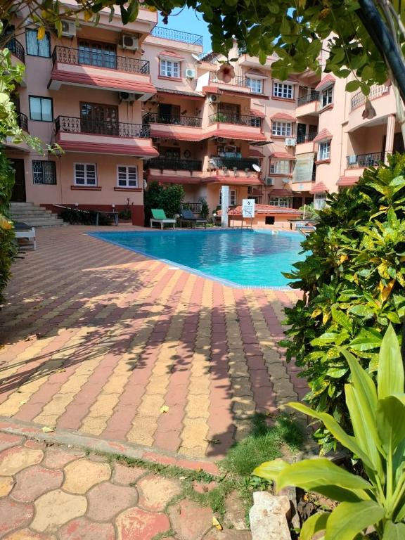 Bazén v ubytování Kyle Calangute 1 bhk luxury apartment with pool nebo v jeho okolí