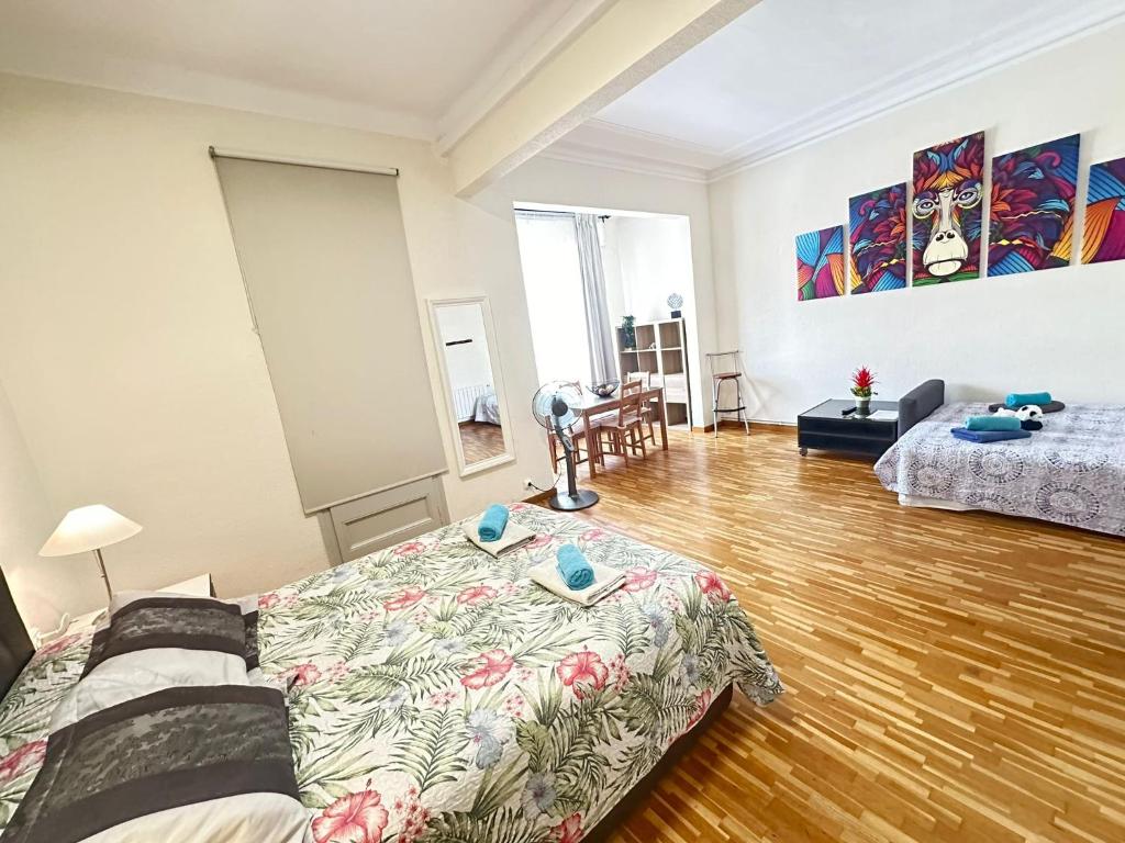Postel nebo postele na pokoji v ubytování Rooms Aribau