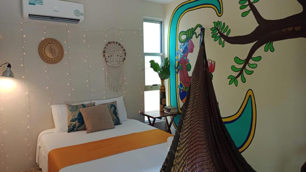 Postel nebo postele na pokoji v ubytování Villa Ixchel Tortugas
