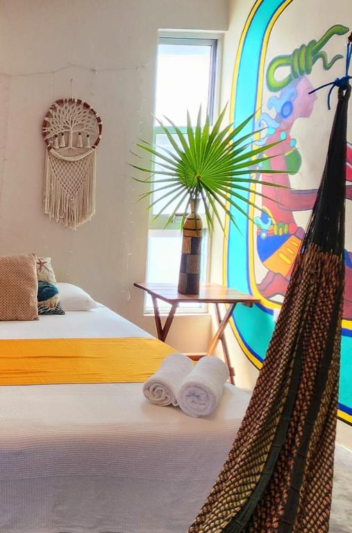 Postel nebo postele na pokoji v ubytování Villa Ixchel Tortugas