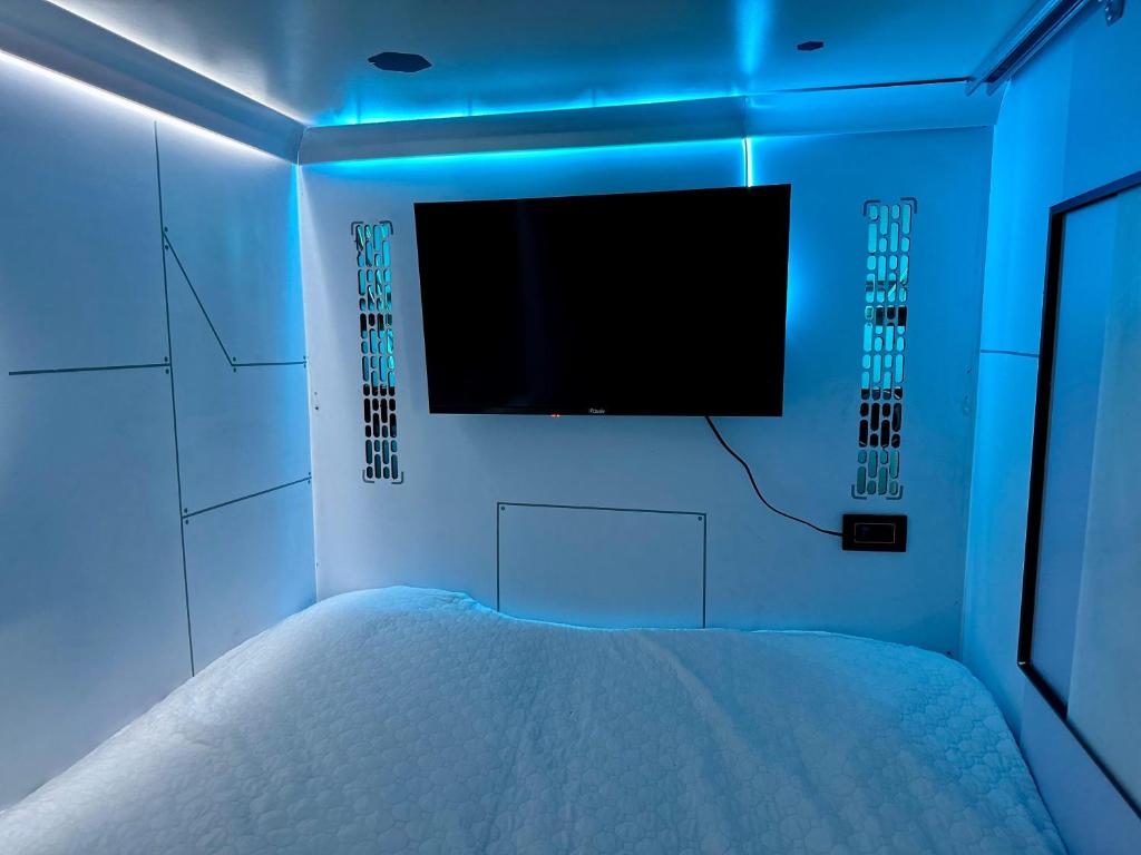 Postel nebo postele na pokoji v ubytování Hotel Capsulas Quito