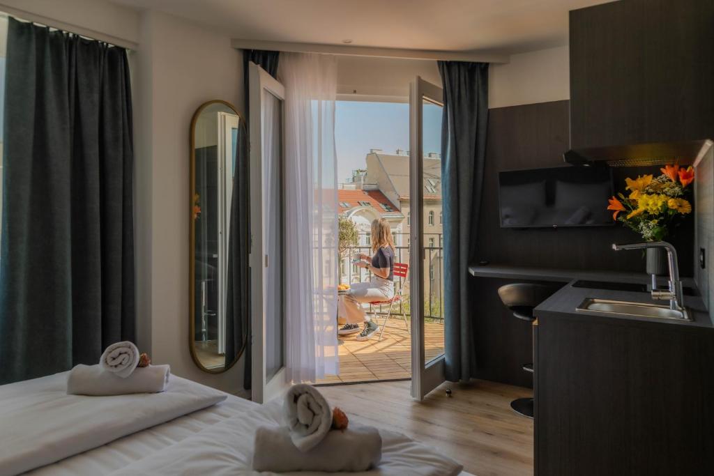 Postel nebo postele na pokoji v ubytování Florum Hotel