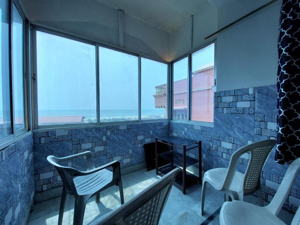 NIRMAN beach homestay - 带有海景的豪华双人或双子室