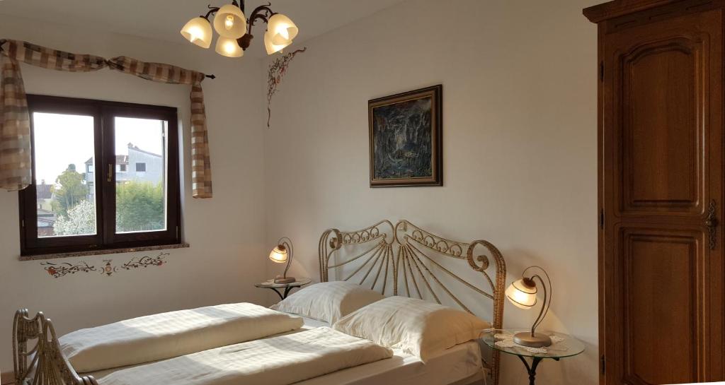 Postel nebo postele na pokoji v ubytování Villa Linet