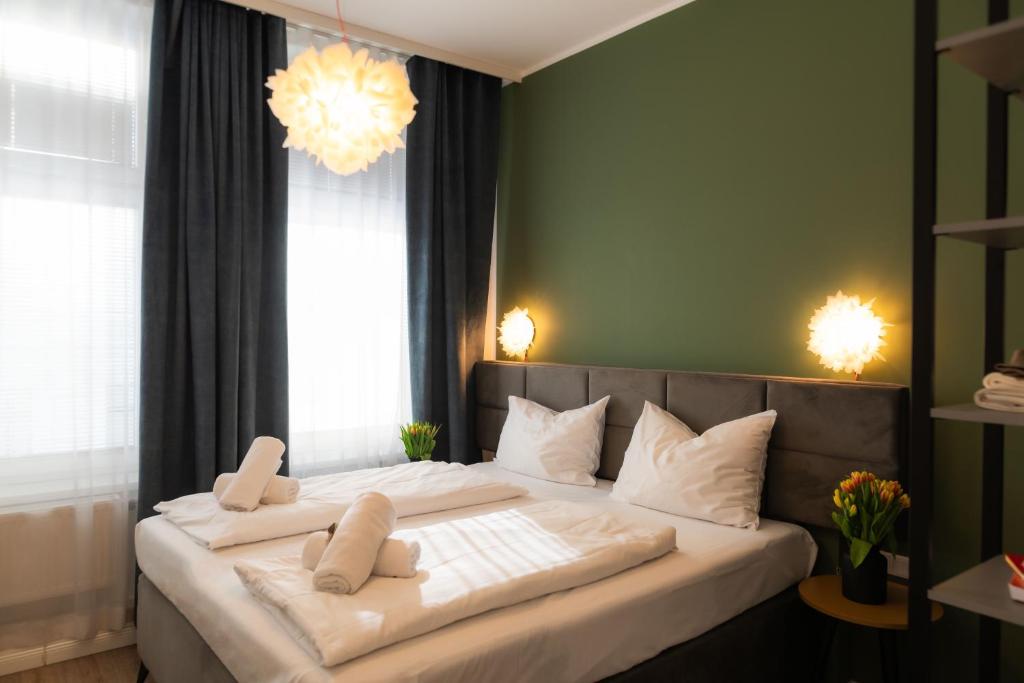 Postel nebo postele na pokoji v ubytování Florum Hotel