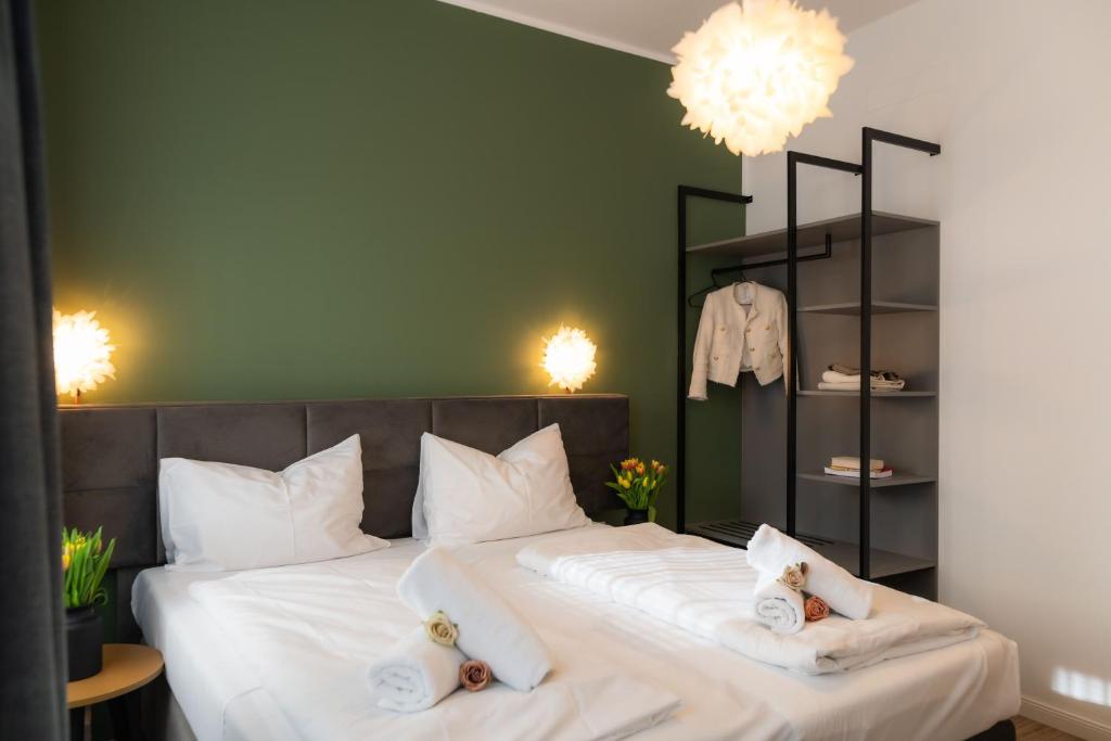 Postel nebo postele na pokoji v ubytování Florum Hotel