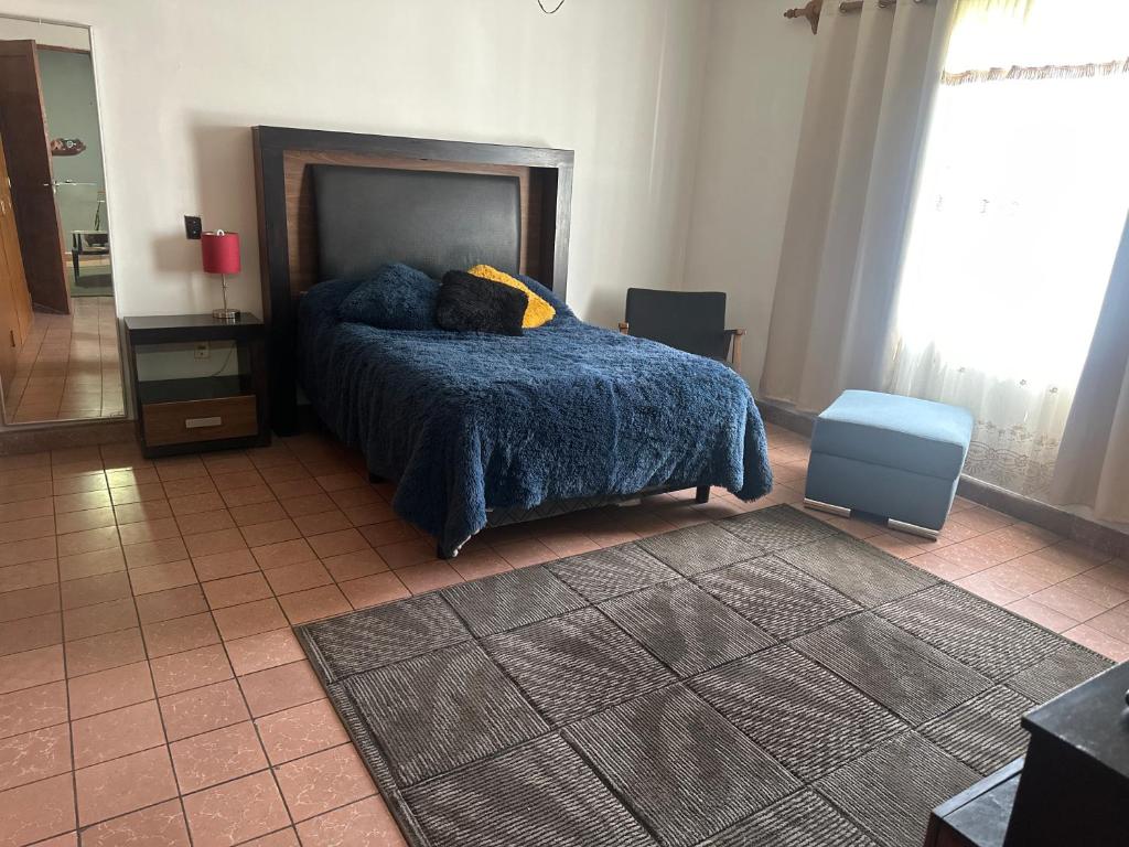 Postel nebo postele na pokoji v ubytování Casa La Minerva