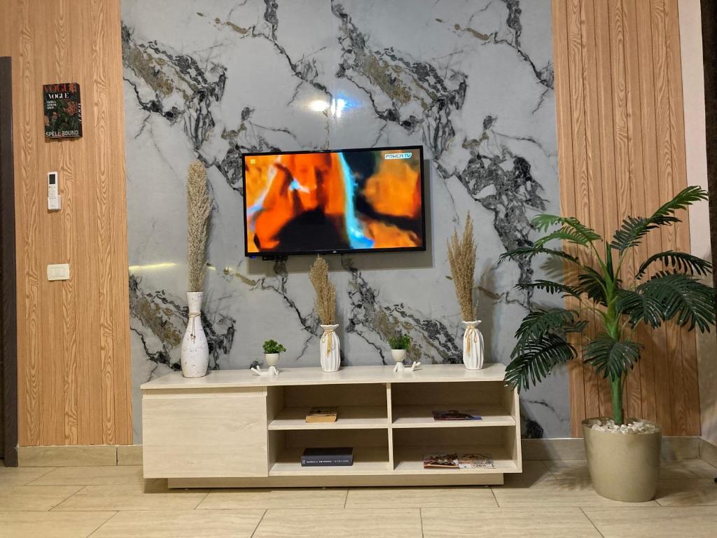 TV a/nebo společenská místnost v ubytování Al Dau Heights