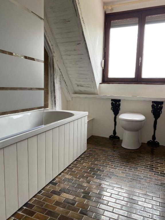 Koupelna v ubytování Chambre d'hôtes de Dompierre