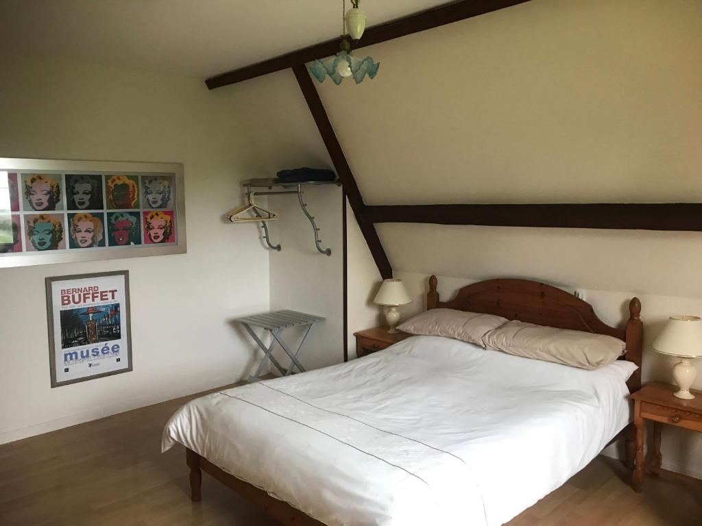 Postel nebo postele na pokoji v ubytování Chambre d'hôtes de Dompierre