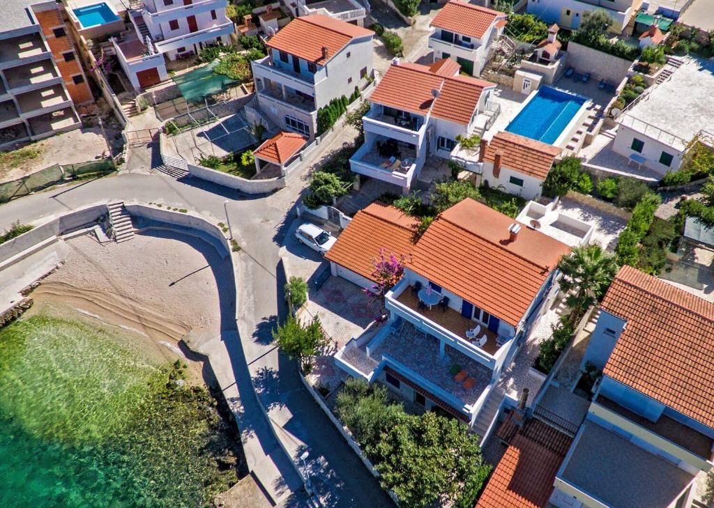 an overhead view of a city with houses and a street at Apartments Modri Dragulj in Ražanj