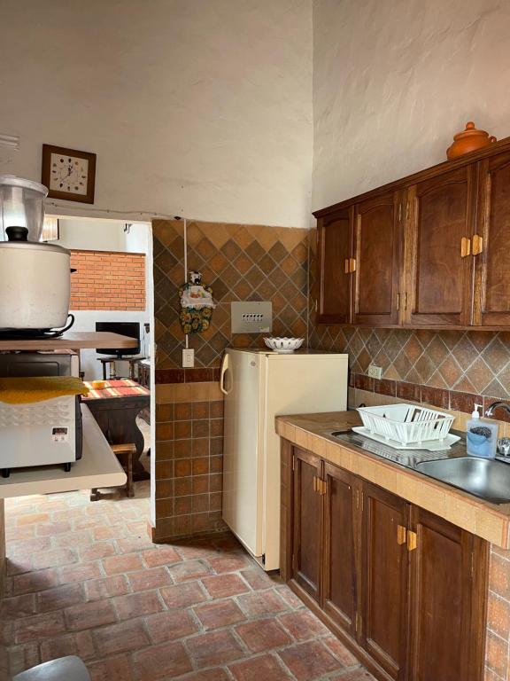 Kuchyň nebo kuchyňský kout v ubytování Casa Raiz