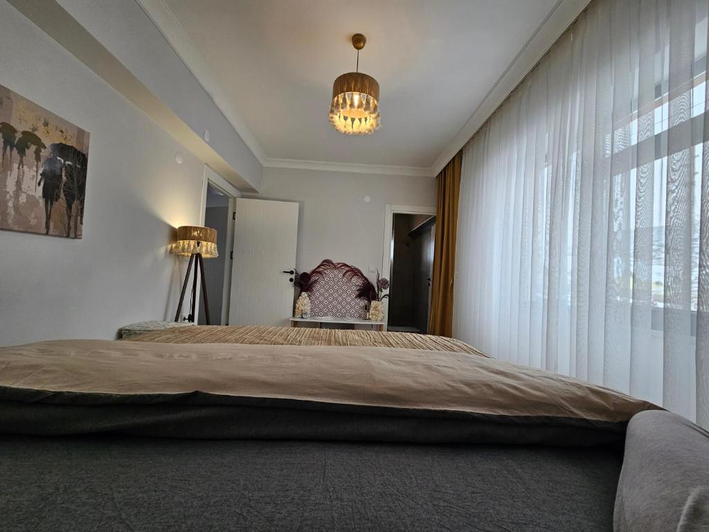 Postel nebo postele na pokoji v ubytování Eagle castle