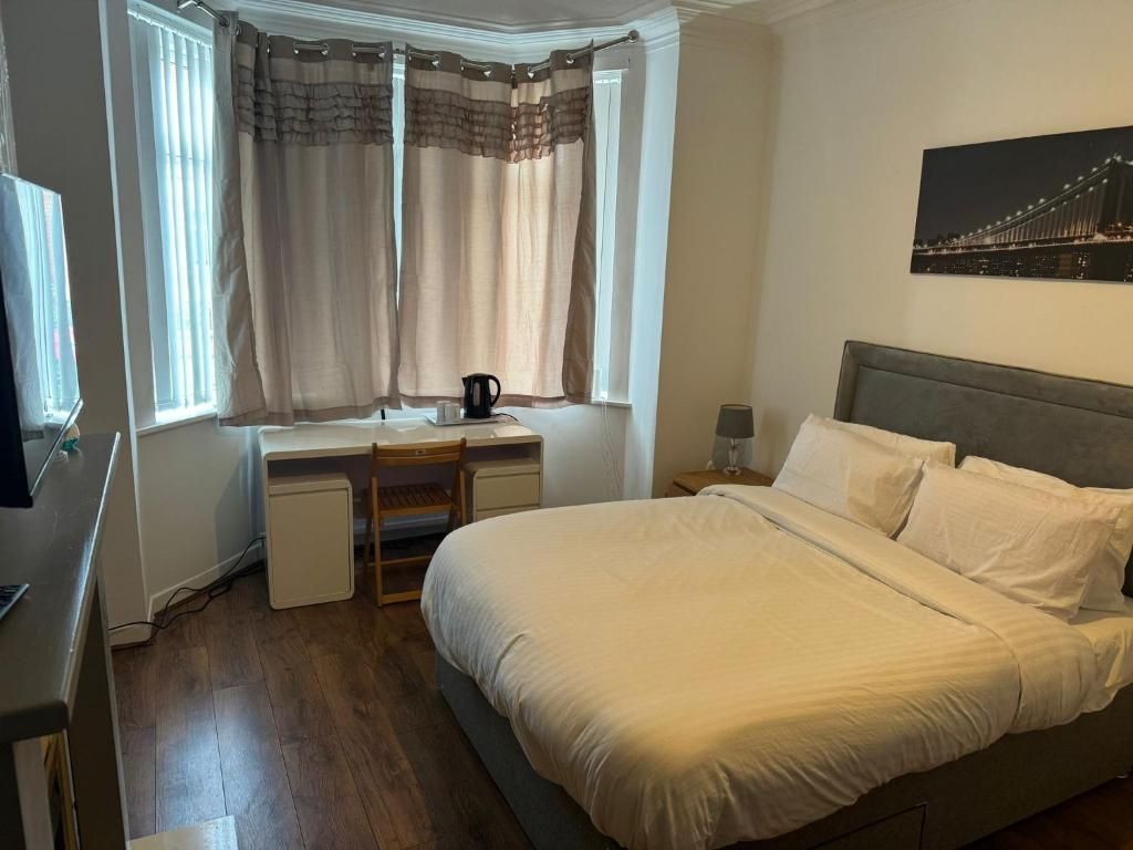Postel nebo postele na pokoji v ubytování Poshval