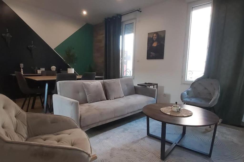 Χώρος καθιστικού στο Les Suite Appartement à Chalon sur Saône