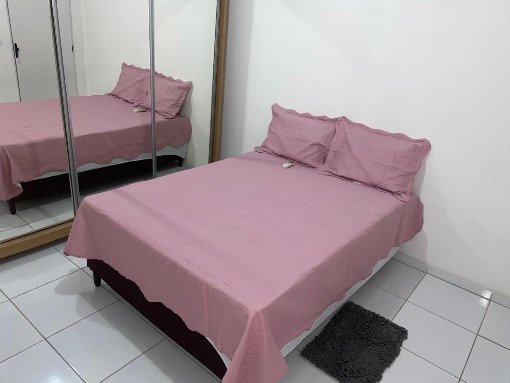 Postel nebo postele na pokoji v ubytování Casa por temporada