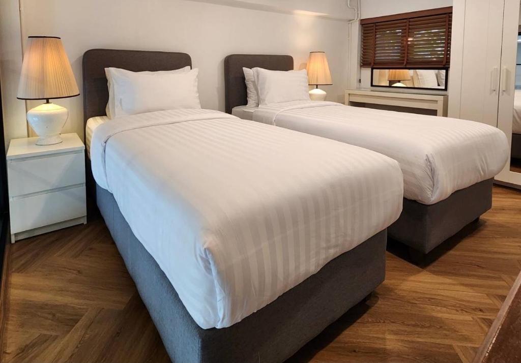 Cama ou camas em um quarto em Sleep Walker Poshtel