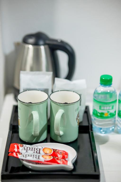 Příslušenství pro přípravu čaje a kávy v ubytování TOBEDzZ HOTEL