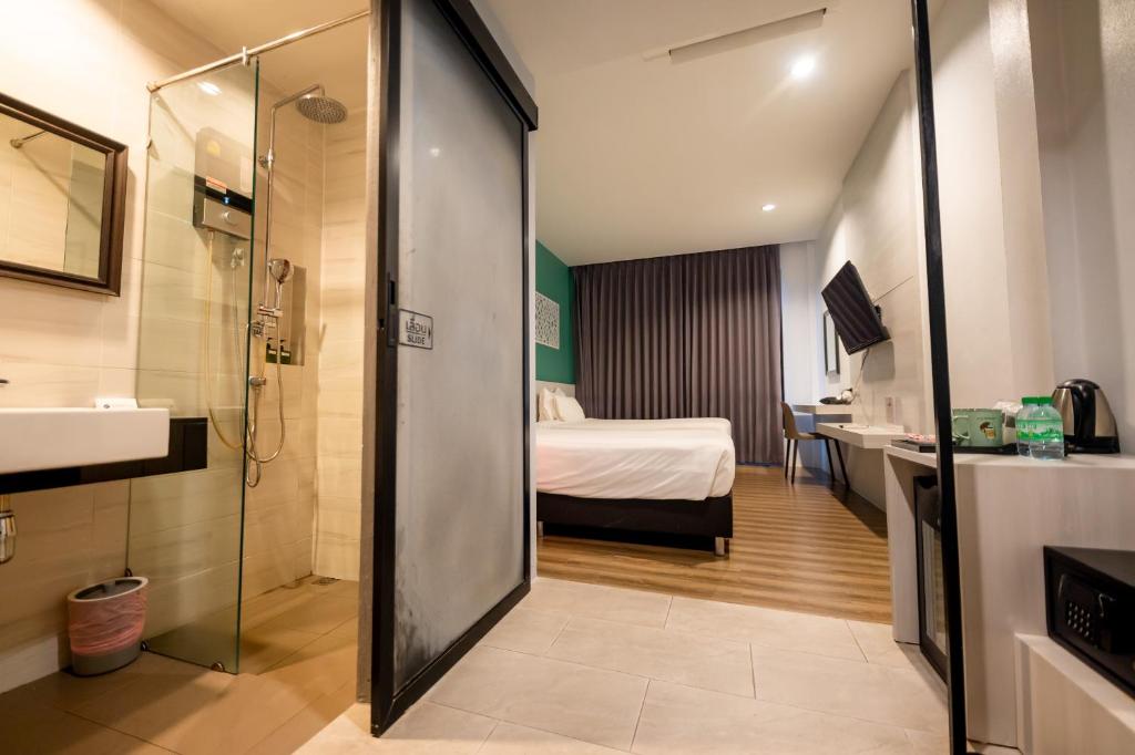 Postel nebo postele na pokoji v ubytování TOBEDzZ HOTEL
