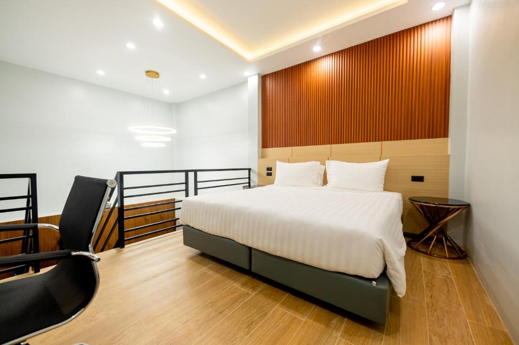 Postel nebo postele na pokoji v ubytování TOBEDzZ HOTEL