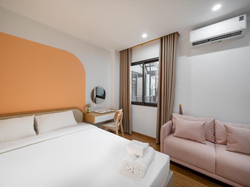 Postel nebo postele na pokoji v ubytování MOONLIT Suites Hotel by Luxe Paradise
