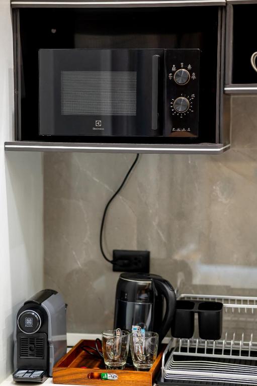 Kuchyň nebo kuchyňský kout v ubytování TOBEDzZ HOTEL