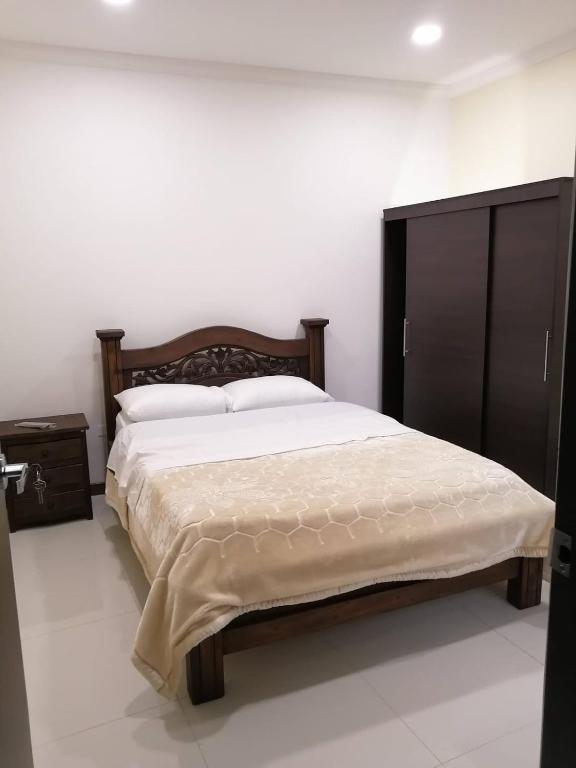 Postel nebo postele na pokoji v ubytování HOTEL El MONARCA