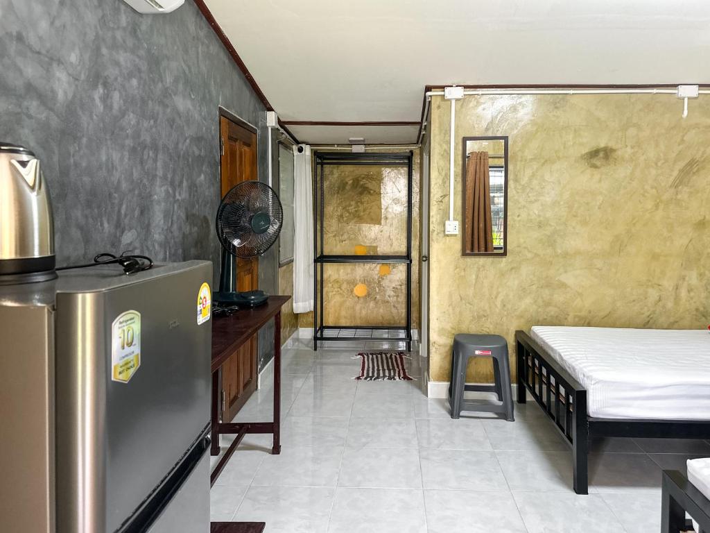 Postel nebo postele na pokoji v ubytování Baan Panmala Guesthouse - Ao Luek, Krabi