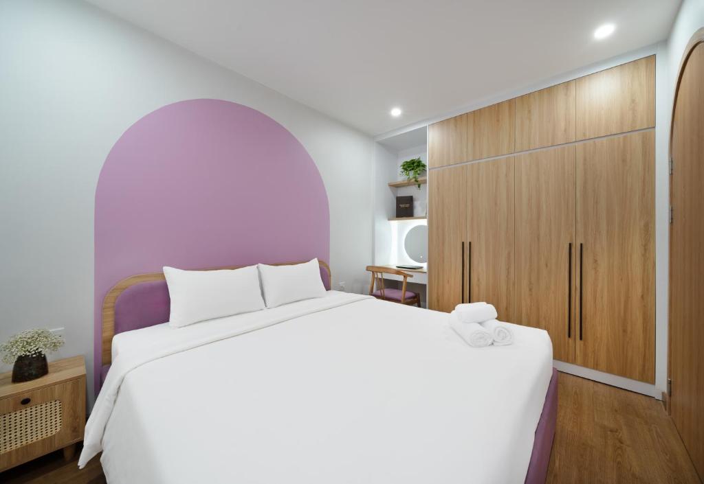 Postel nebo postele na pokoji v ubytování MOONLIT Suites Hotel by Luxe Paradise