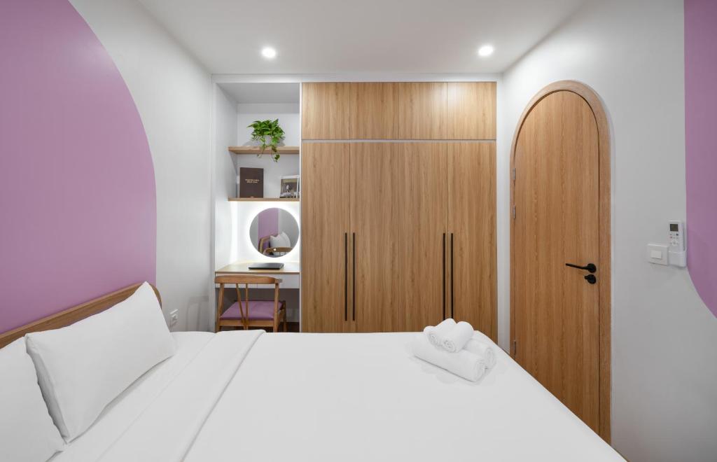 Postel nebo postele na pokoji v ubytování MOONLIT Suites Hotel by Luxe Paradise