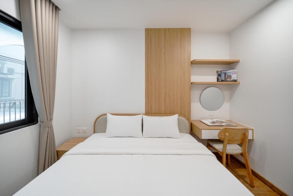 Postel nebo postele na pokoji v ubytování MOONLIT Suites Hotel by Luxe Paradise