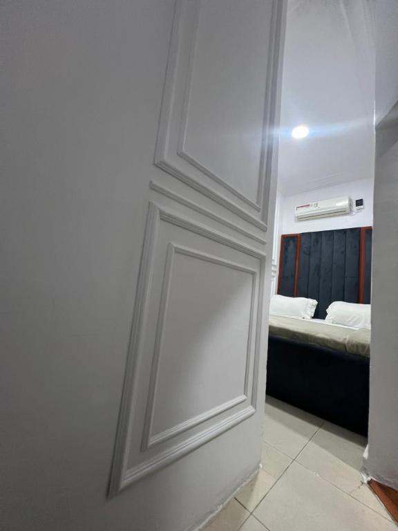 Postel nebo postele na pokoji v ubytování J Gibson suite
