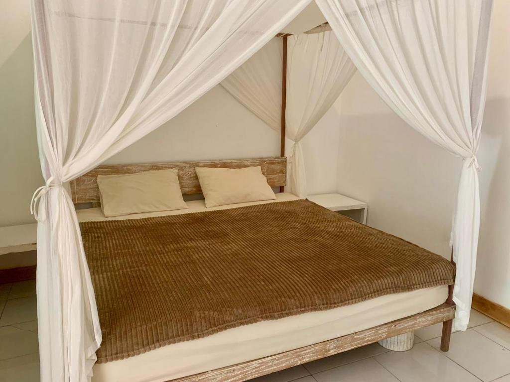 the village rua beach homestay - Deluxe Queen Room