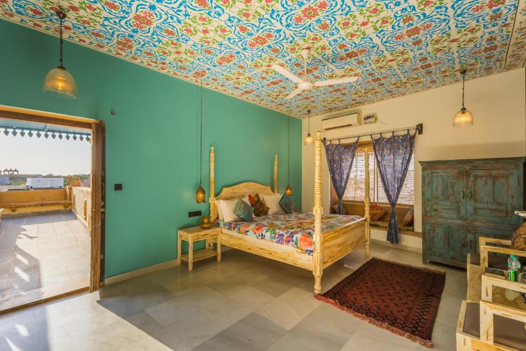 Postel nebo postele na pokoji v ubytování Hotel Heritage House