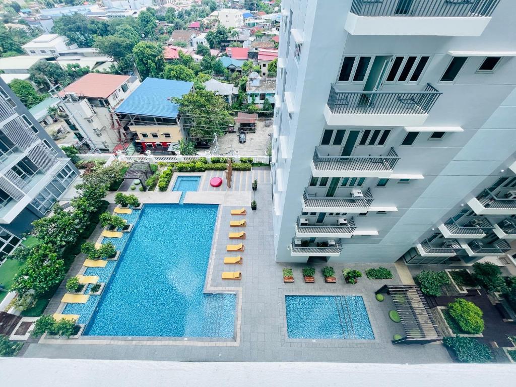 an aerial view of an apartment complex with a swimming pool at LaFayette Park Square in Iloilo City