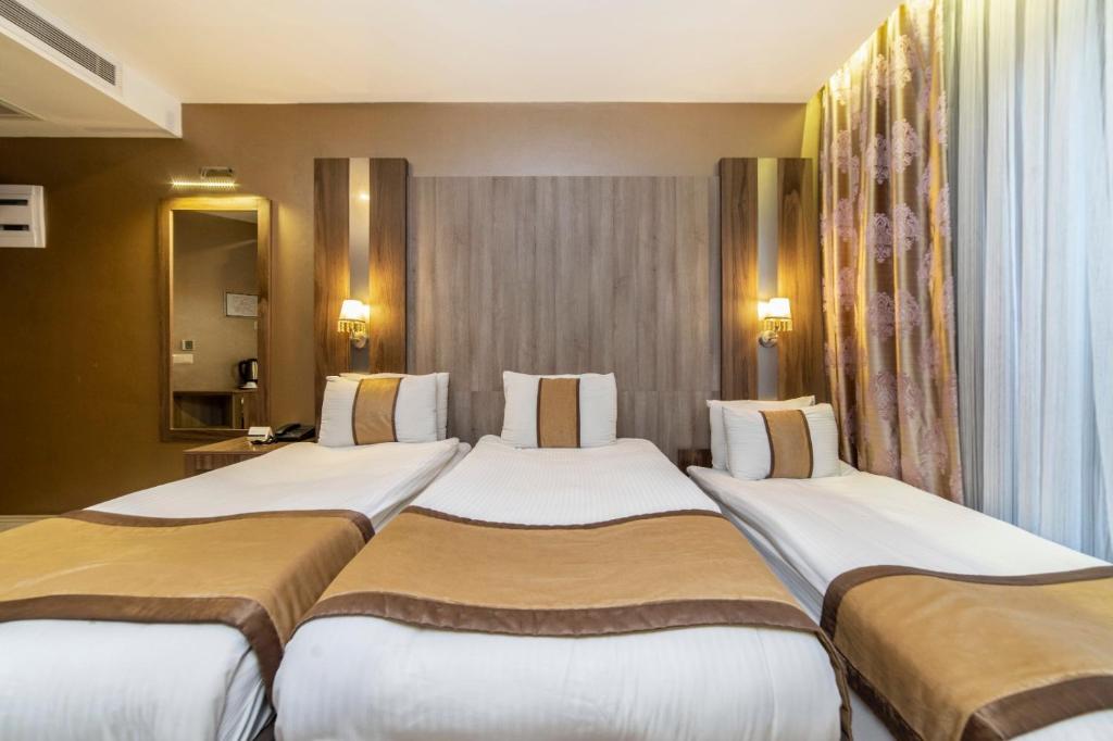 Royal Capital Hotel Bursaにあるベッド