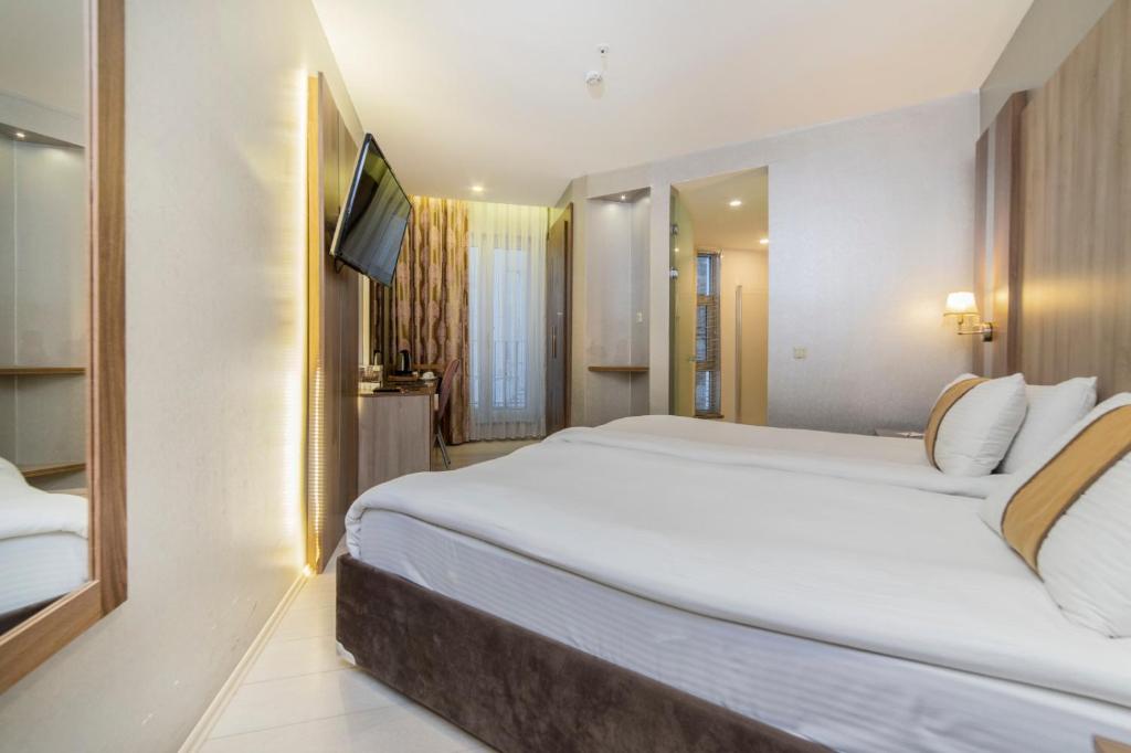 Royal Capital Hotel Bursaにあるベッド